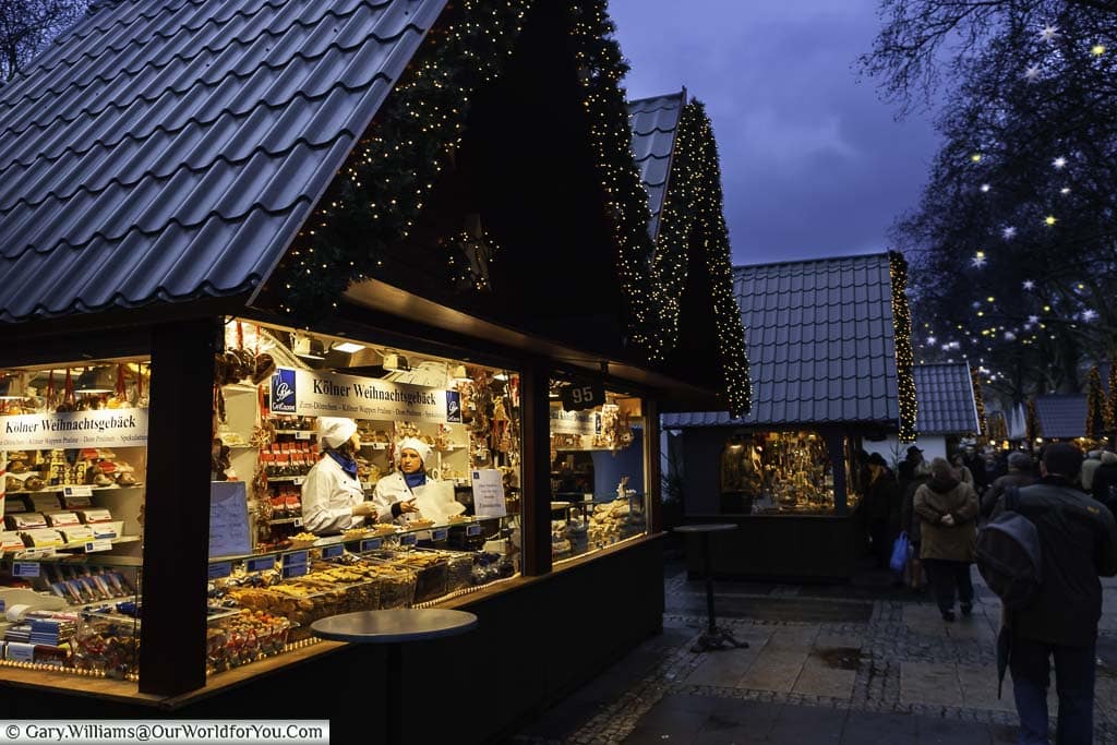 A bakery stall in the angel christmas market in cologne at dusk