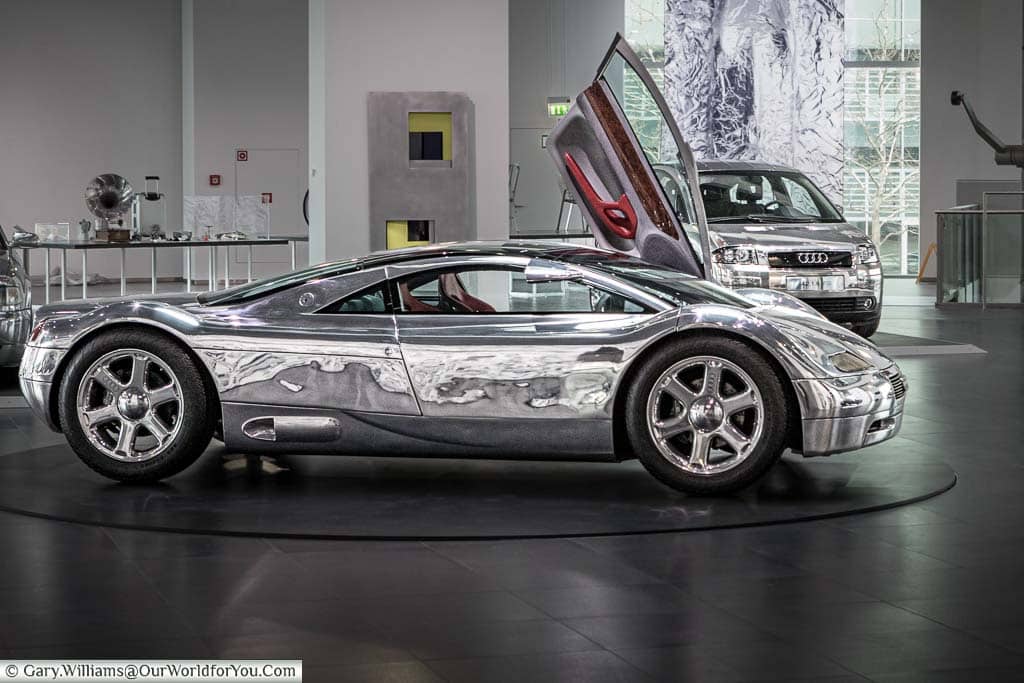 An audi avus concept car from the 1991 in a chrome wrap on display in the audi forum ingolstadt