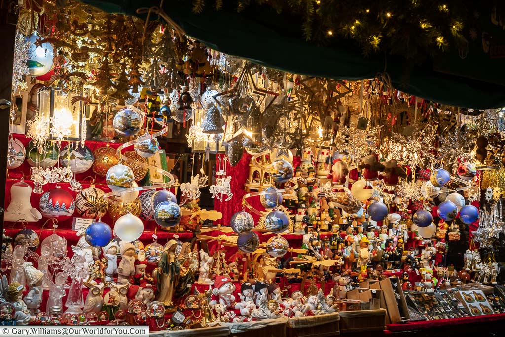 A collection of mixed christmas decorations on nuremberg’s historic christkindlesmarkt, a selection of what you can find in nuremberg at christmas.
