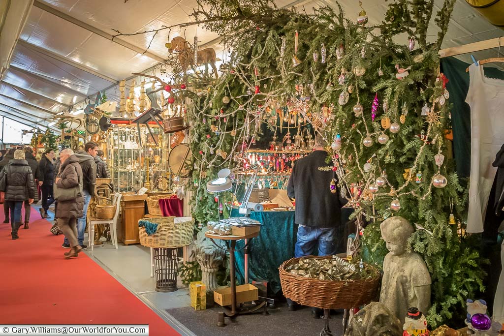 A collection of stalls inside a marquee with a focus on antiques in stuttgart's christmas markets