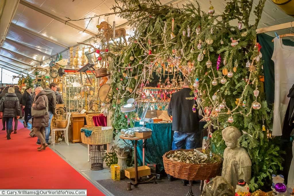 A collection of stalls inside a marquee with a focus on antiques in stuttgart's christmas markets