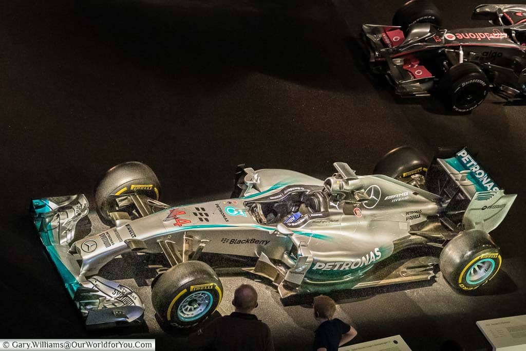 Lewis Hamiltons 2014 F1 Grand Prix car on display on a banked section of 'track' inside the mercedes benz museum in stuttgart