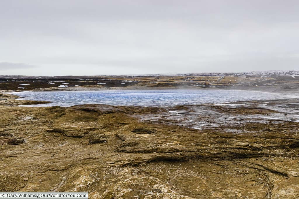 A hot spring pool at the Haukadalur geothermal area in Iceland's Golden Circle