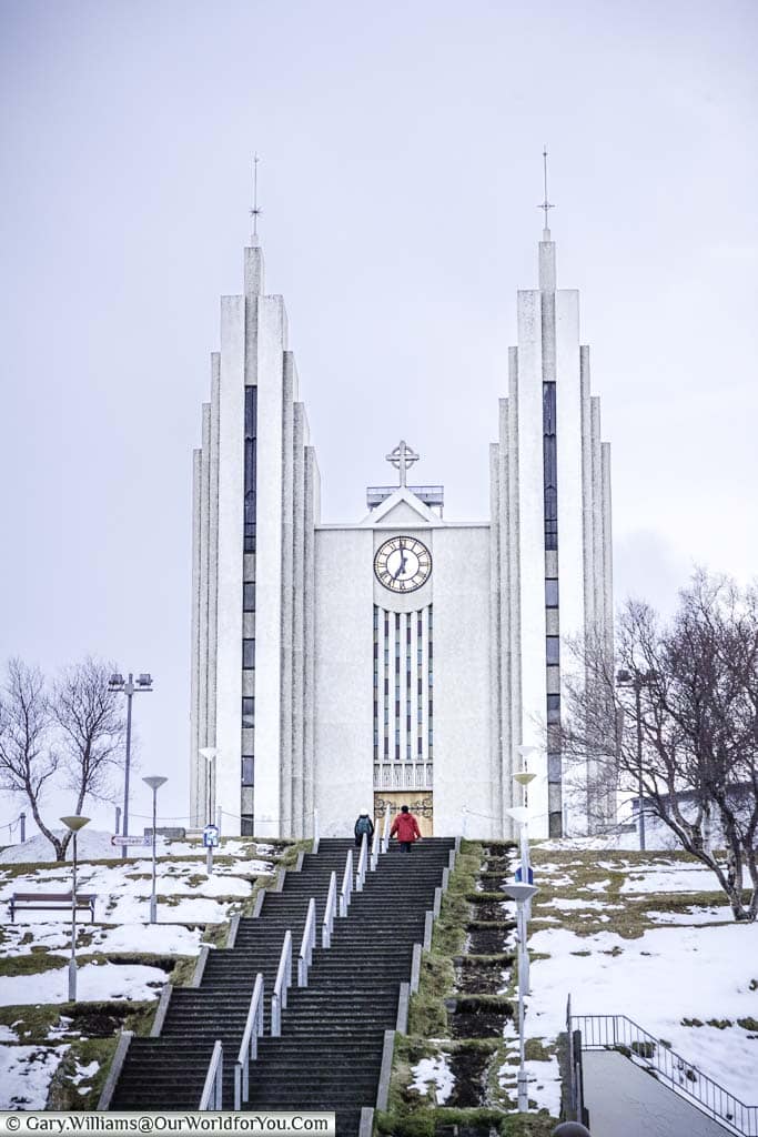 The iconic modern Akureyri church in white high on the hill top