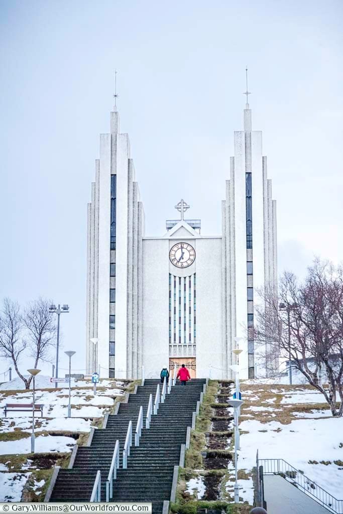 The iconic modern Akureyri church in white high on the hill top