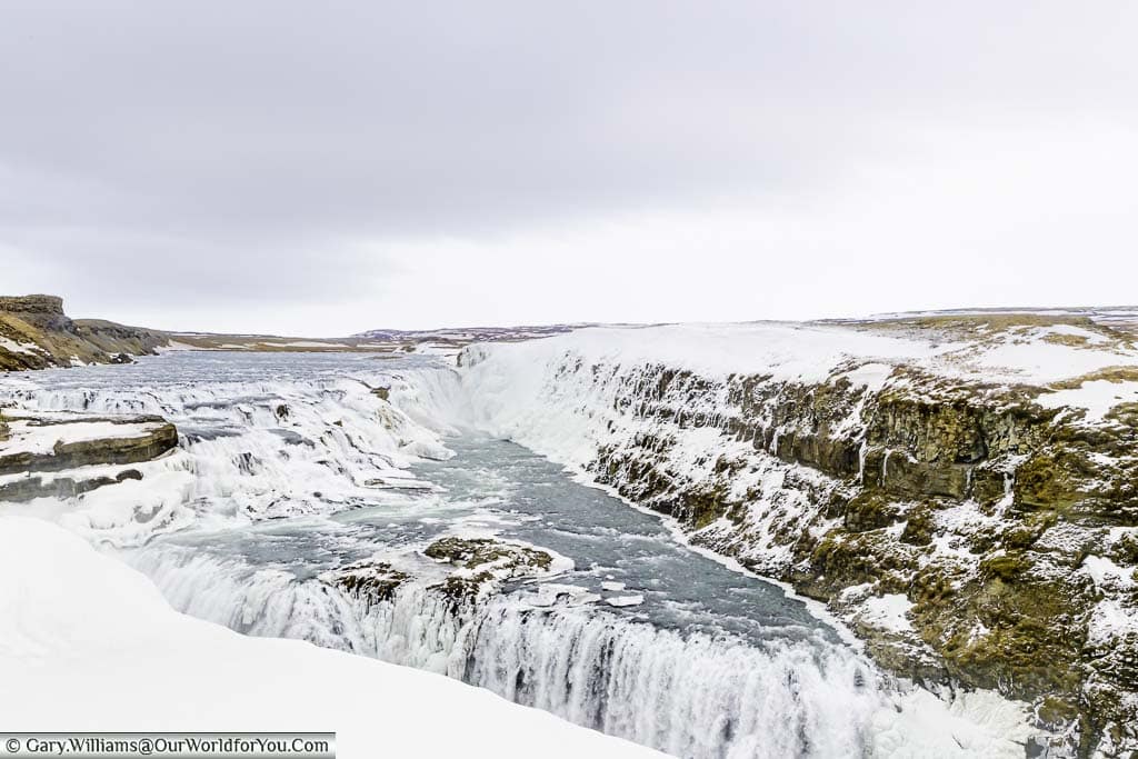 The stunning Gullfoss waterfall captured in mid-March with ice still remaining around the edges. A must-see on Iceland's Golden Circle.