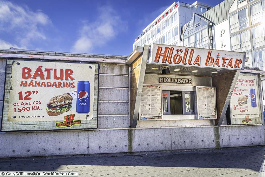A whole-in-the wall- hotdog vendors cabin in central reykjavik, iceland