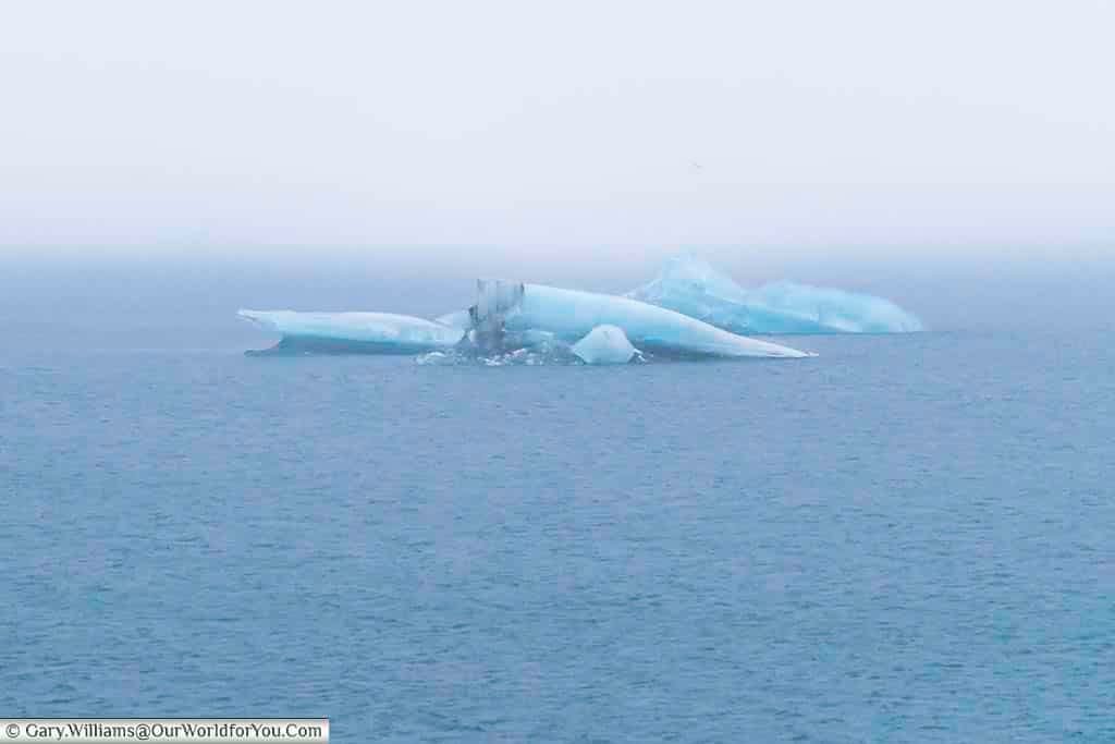 Several small icebergs in the glacier in the Jökulsárlón glacial lagoon, Iceland