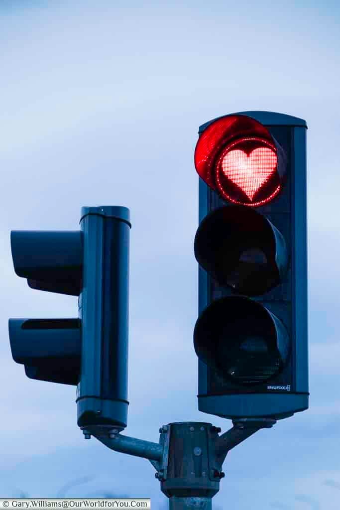 A heart-shaped red traffic light in Akureyri, Iceland