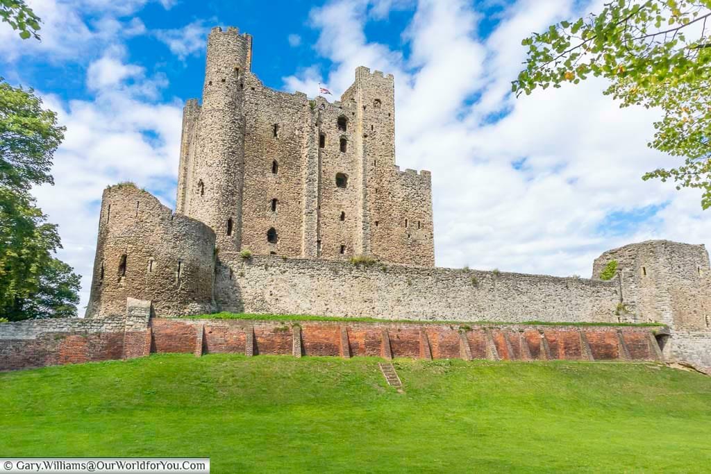 Looking up at the Keep of Rochester Castle from the now dried out moat that surrounds it.