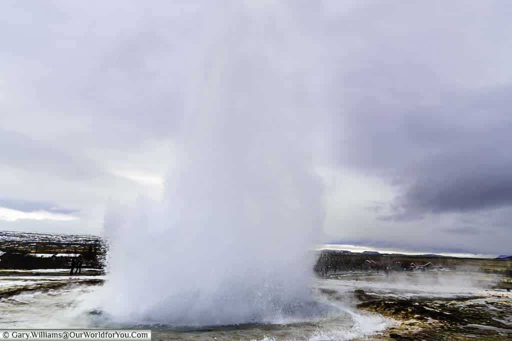 The end of the eruption of the Strokkur geyser with the water collapsing back on itself.