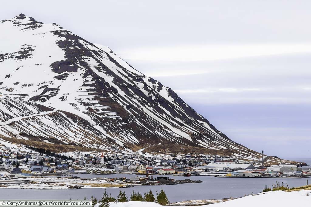 The small town of Siglufjörður at the base of a mountain in Northern Iceland