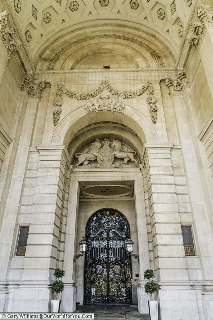 The decorative stone arch conceals iron gates at one of the entrances to the Royal Exchange