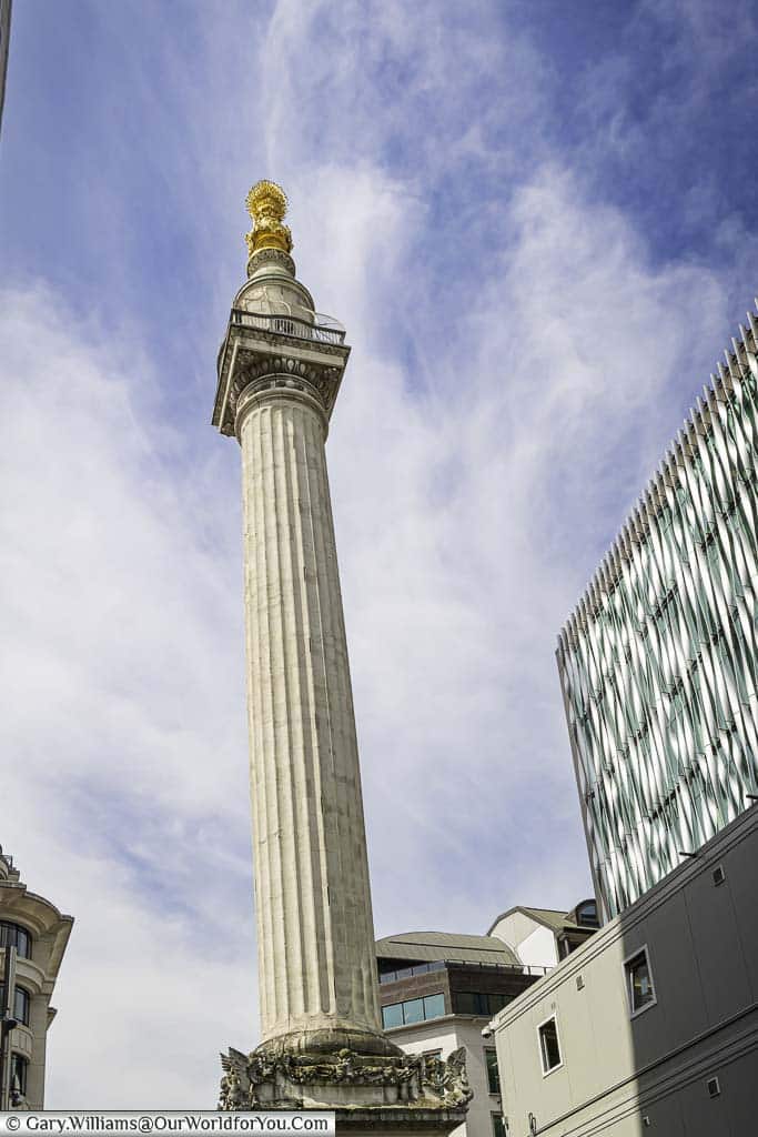 The lone Doric column topped a golden fireball know as the Monument.
