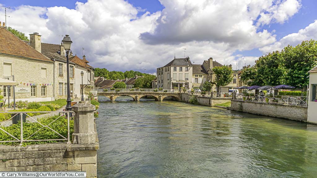 The river Ourse flowing through the centre of Essoyes in the Champagne region of France