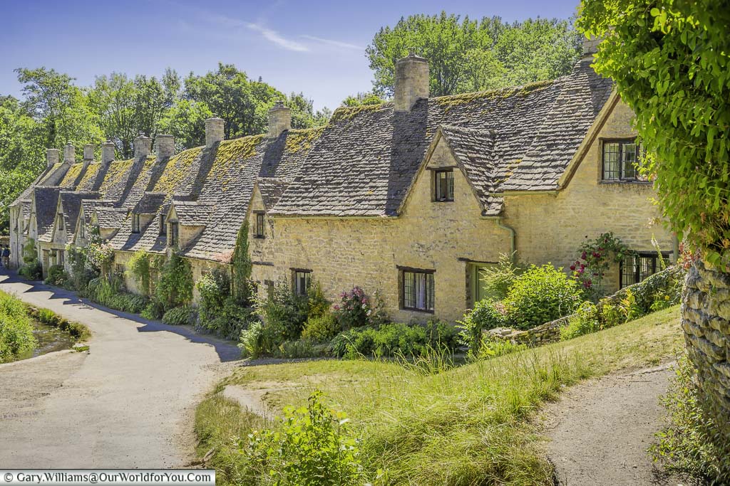 Looking down at the stone cottages of Arlington Row in Bibury