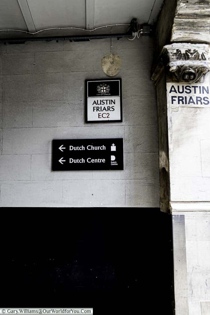 A modern sign for Austin Friars Passage, that leads to the Dutch Church & Dutch Centre, in the City of London.