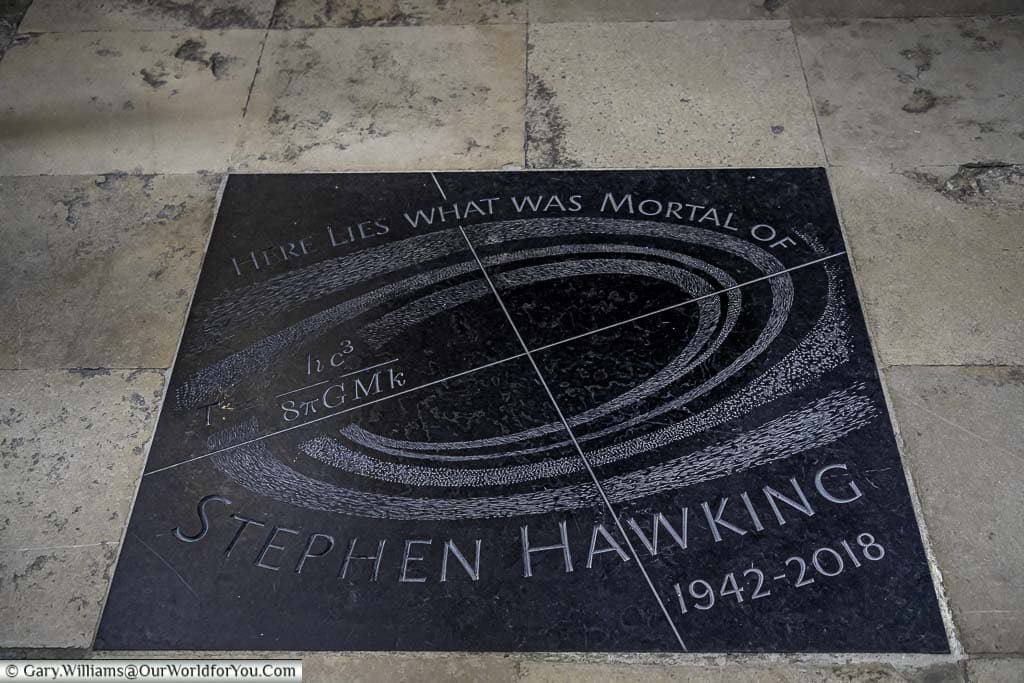 A grey slate monument dedicated to Professor Stephen Hawking in the scientist’s corner of westminster abbey in london