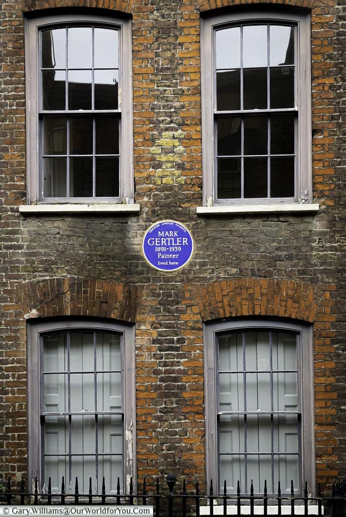 A blue plaque to Mark Gertler, a 20th-century painter along Elder St, Spitalfields