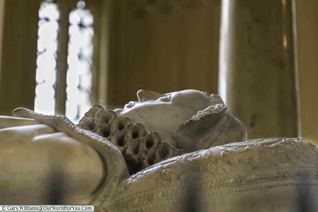 The white marble effigy of Mary Queen of Scots laid on her tomb in westminster abbey in london