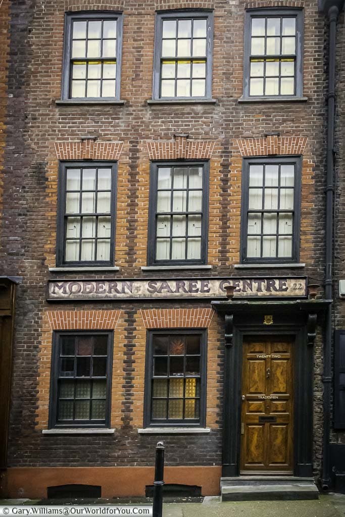 A beautiful brick building in Princelet Street, Spitalfields, that is now home to the Modern Saree Centre.