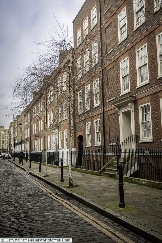 The cobbled Folgate Street with its elegant Georgian buildings in the Spitalfield district.
