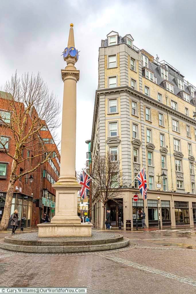 The column at the centre of Seven dials. A junction where seven roads meet. Don't count the dials at the top of the column as you will notice there are only 6.