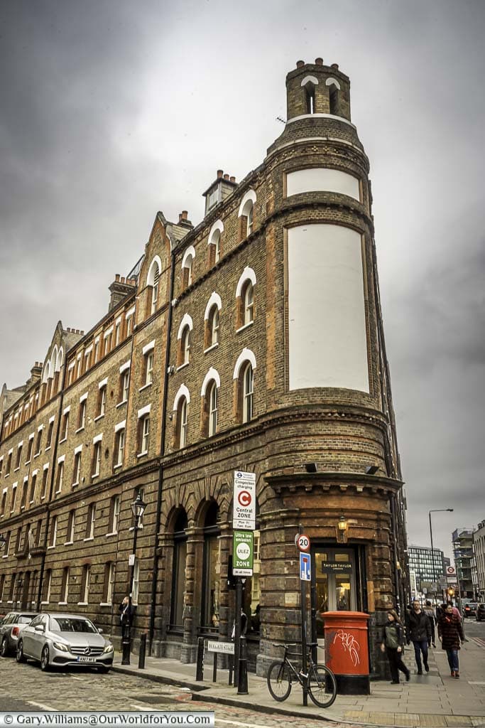 A brick triangular 5-storey building in Spitalfields resembling New York's Flat Iron Building.