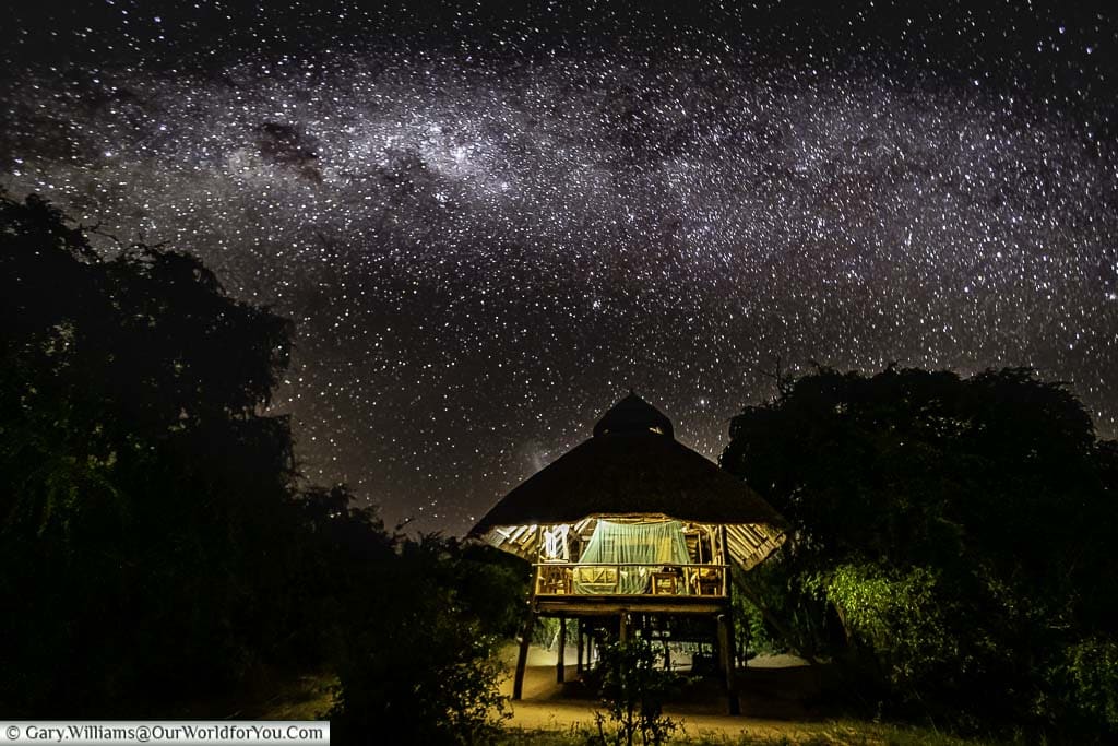 The lodge, under a full African night sky.