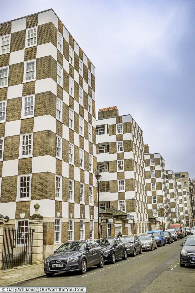 A series of six-storey social housing tower blocks in Westminster featuring an unusual checkerboard facade.