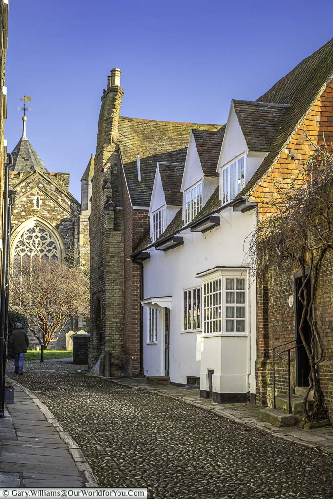 The cobble west street leads to the church of saint mary the virgin in rye, east sussex