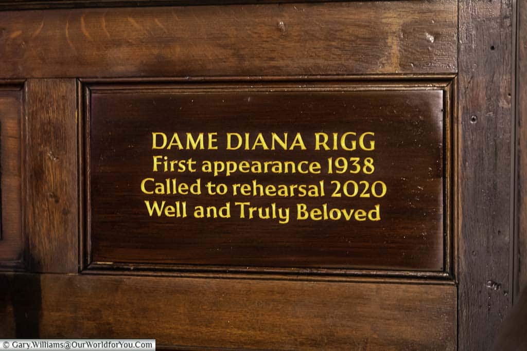 A wooden place memorial to the actress Dame Diana Rigg in st paul’s church, covent garden