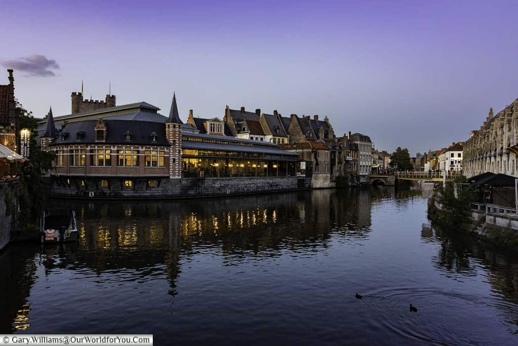 The Fish Market as seen from the Grasbrug bridge in the centre of Ghent at dusk.