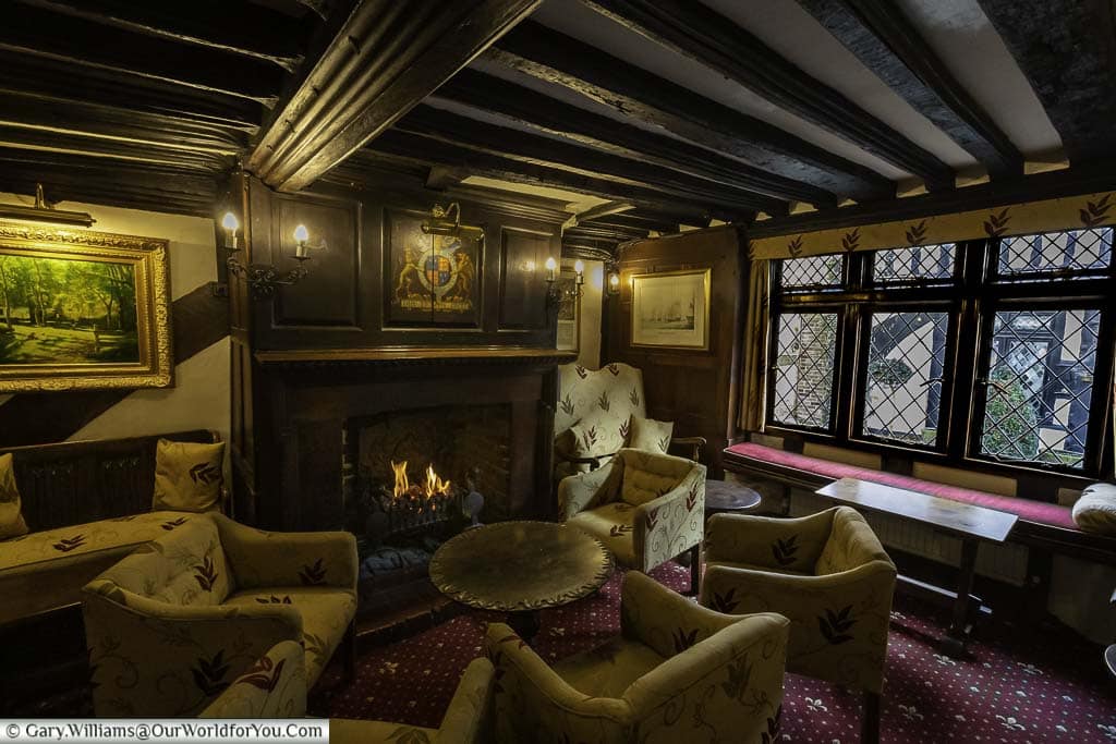 A roaring fire in the cosy lounge of the mermaid inn in rye, east sussex