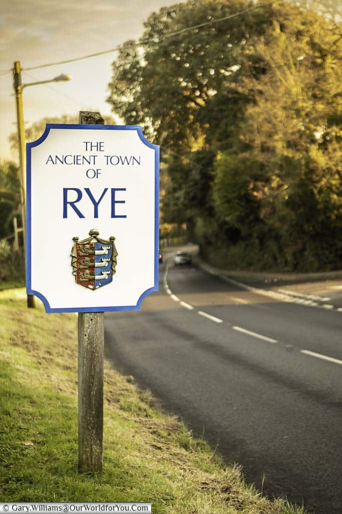 The relatively modern town sign at the border of the ancient town of rye, complete with the motif of the cinque ports confederation, in east sussex