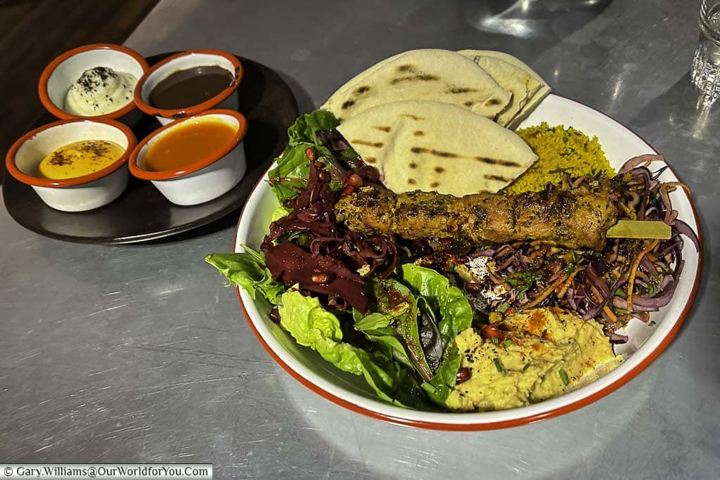 A freshly prepared Lebanese chicken shish in a bowl from the kitchen in the storyhouse in chester