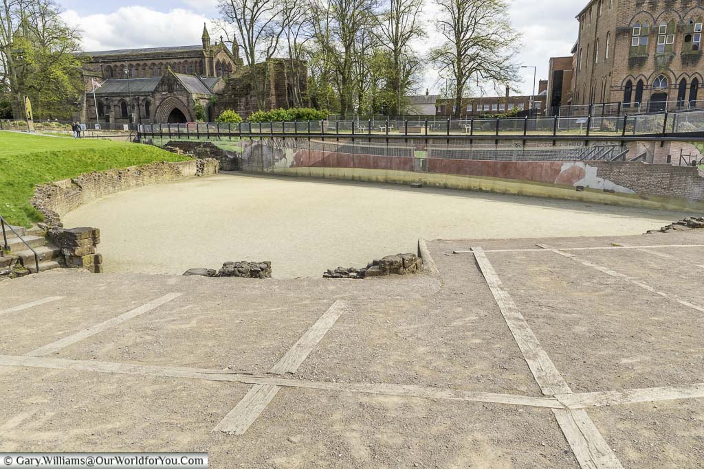 The exposed half of the sandy arena of the roman amphitheatre in chester