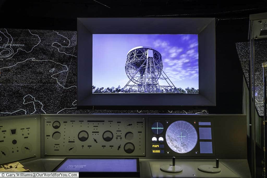 An interactive control desk for the lovell telescope in the main hall of the first light pavilion in jodrell bank in cheshire