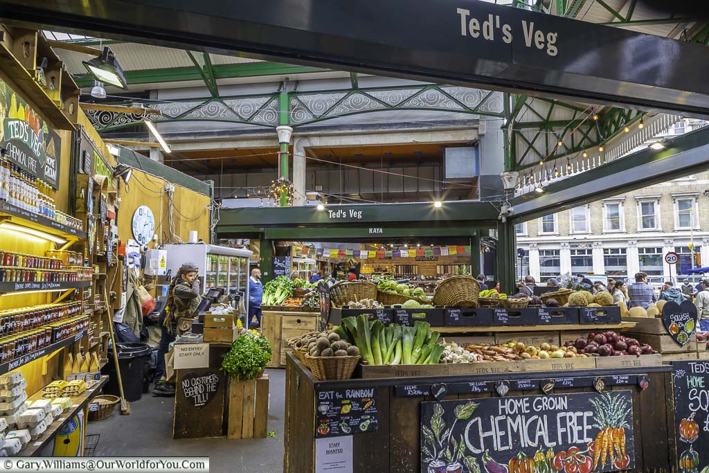 A well-stocked fruit and veg stall in london's borough market in the heart of the bankside area