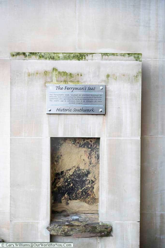 The ancient ferryman's seat set into a modern building on london's bankside