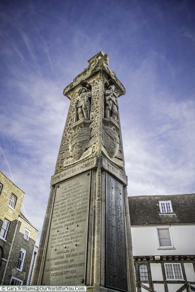 The stone war memorial in the Buttermarket area of Canterbury