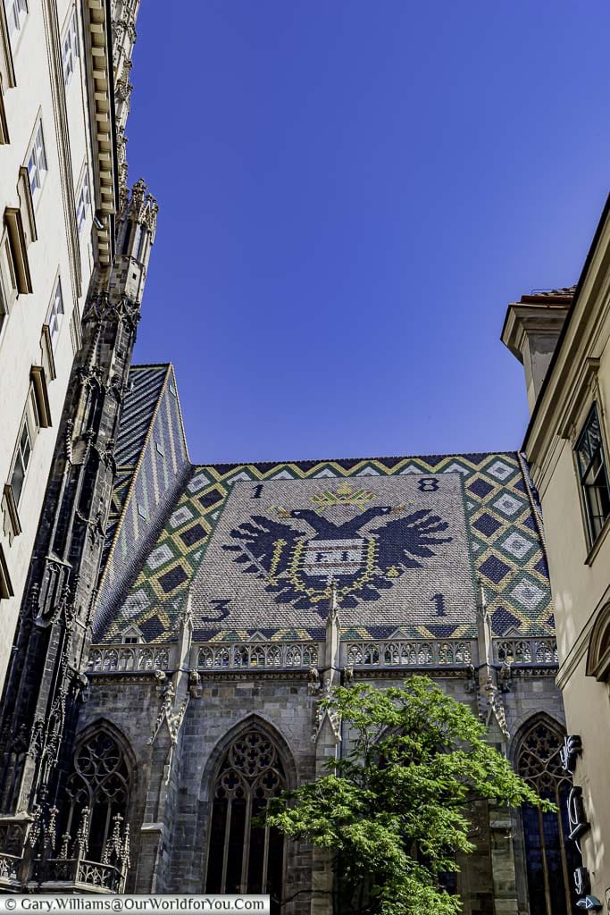 Looking towards the roof of St. Stephen’s Cathedral on which Vienna's city motif of a doubled headed eagle is depicted in the tiles.
