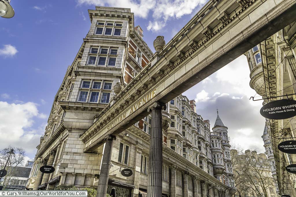 The entrance to sicilian avenue, a row of ornate georgian periods shops, as seen from bloomsbury square, close to holborn station