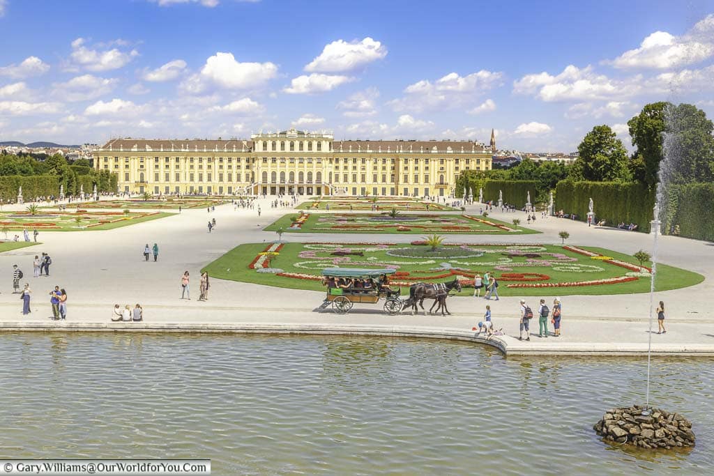 The view of the Schönbrunn Palace from the top of the Neptune Fountain, Vienna, Austria