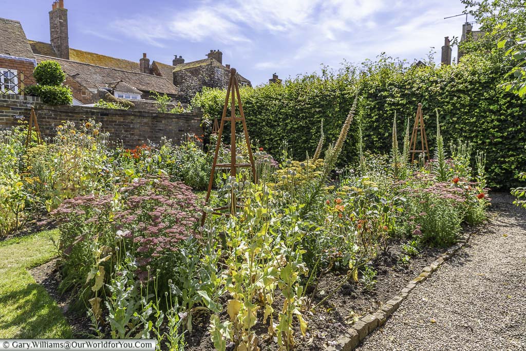 A cottage garden bed in the garden of lamb house in rye, east sussex