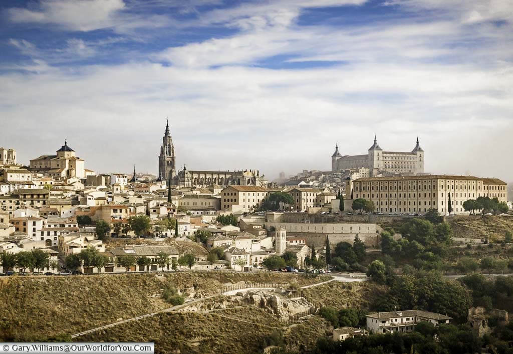 The view from a mirador just outside the centre of old Toledo, taking in a view of the city, high on the hill, with its Cathedral & Alcazar dominating the skyline