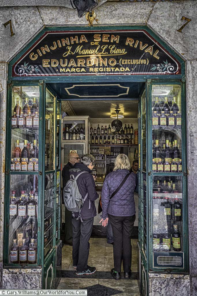 Queuing for a shot of Ginjinha Sem Rival at a tiny little shop in the centre of Lisbon, Portugal