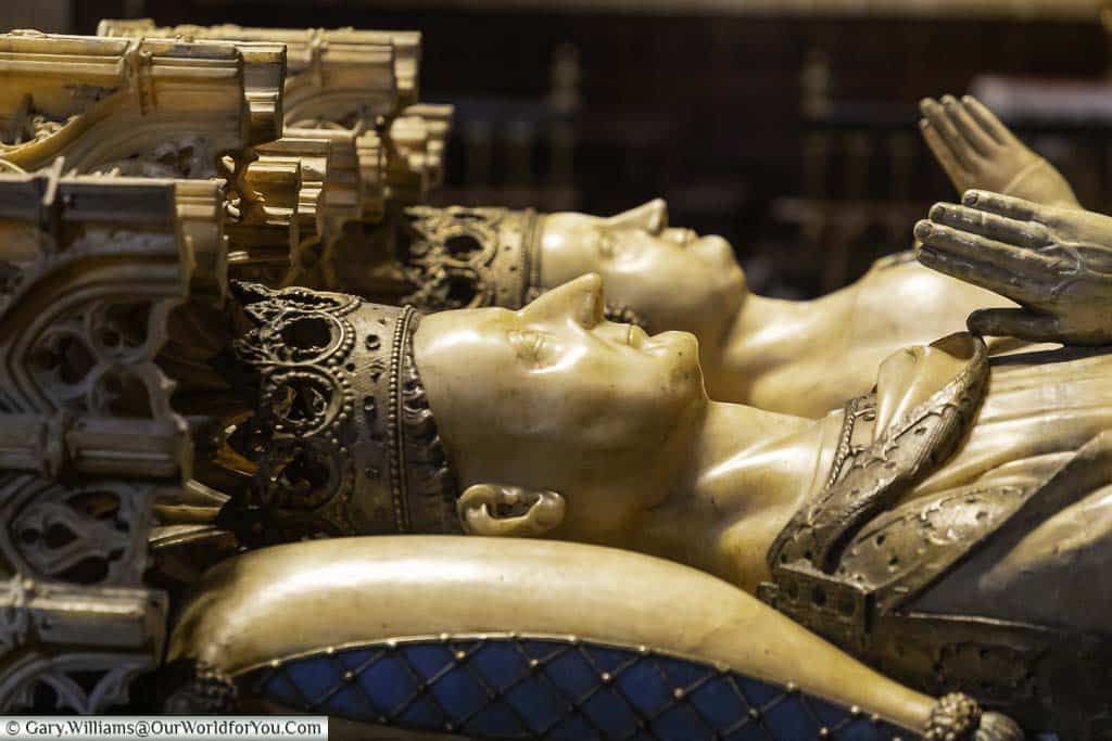The two marble figures of Charles III of Navarre & his wife Eleanor lying with their hands set as if praying in their mausoleum in pamplona cathedral in spain