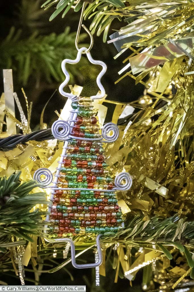A simple wire christmas tree decoratoration with coloured beads from namibia