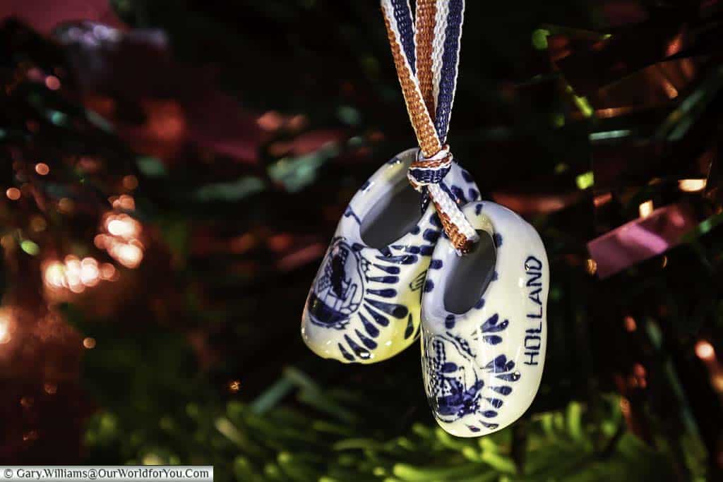 Two white and blue Dutch Clogs christmas decoration hanging in our christmas tree